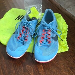 Nike running shoes worn one time. Comes with everything included in picture.